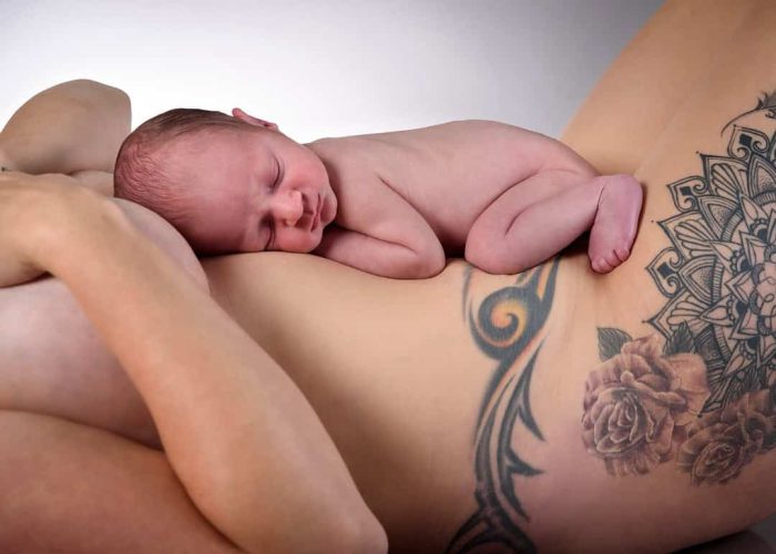 Baby lying on mother’s stomach