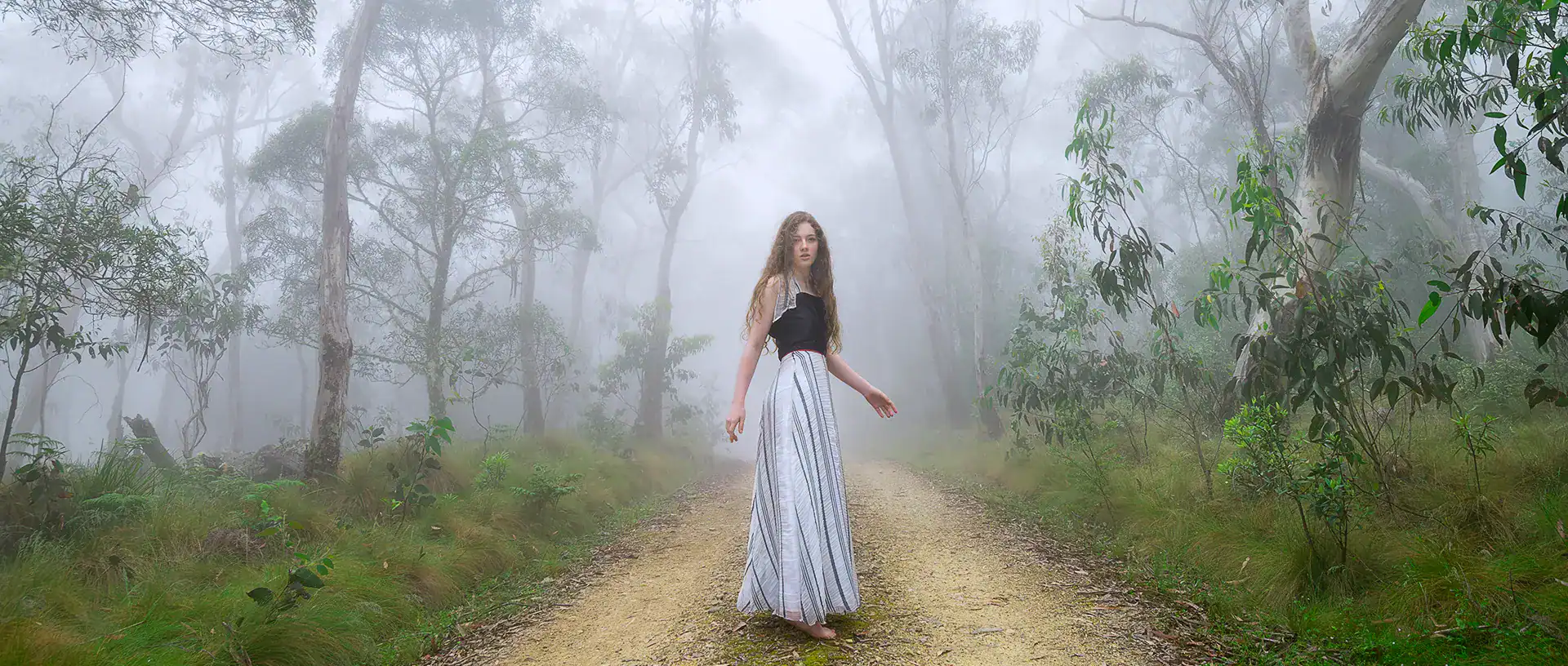 Girl enjoying rainforest photography session in Coffs Harbour