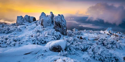 Mount Wellington shrouded in mist Tasmania Australia with rugged peaks emerging through low clouds fine art print