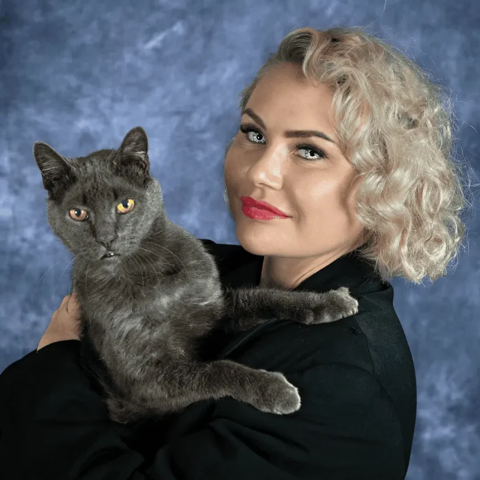 Studio portrait of a lady with her cat