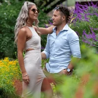 Couple enjoying a quiet moment together in a garden
