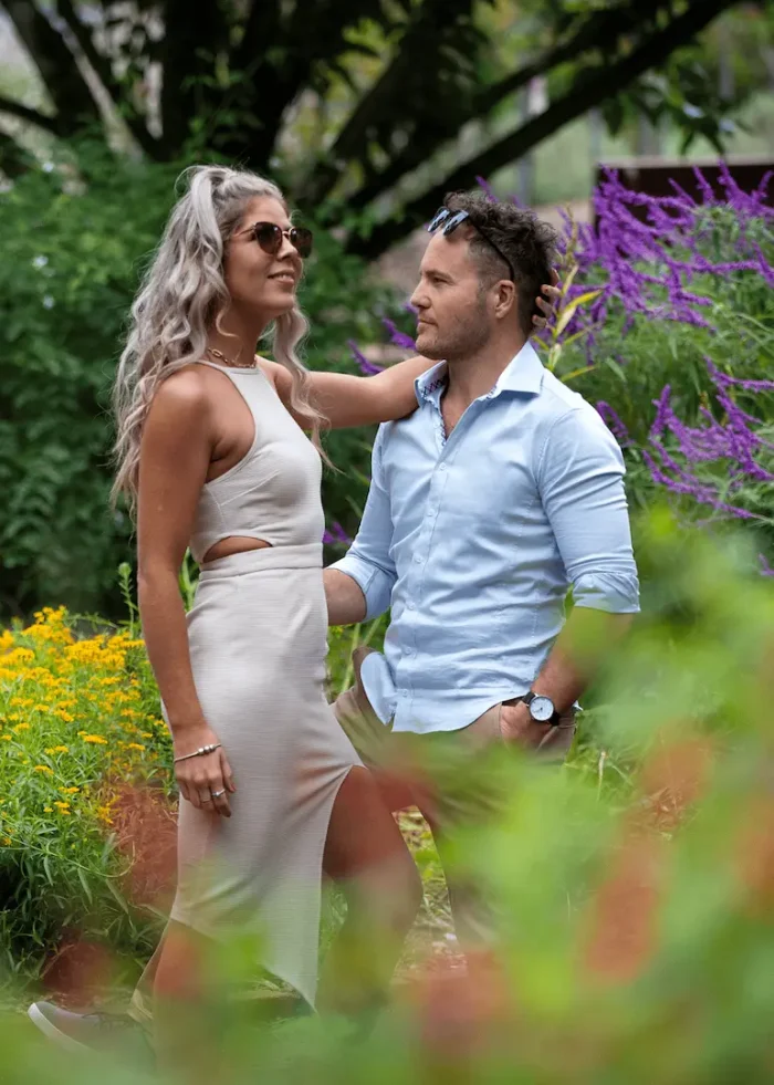 Couple enjoying a quiet moment together in a garden