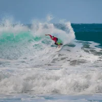 Surfer riding waves at Coffs Harbour