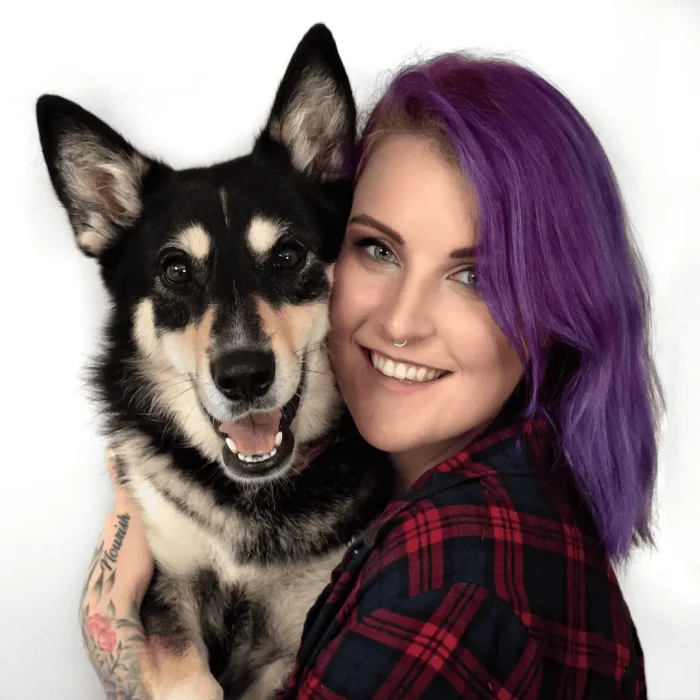 Studio portrait of a lady with her pet dog