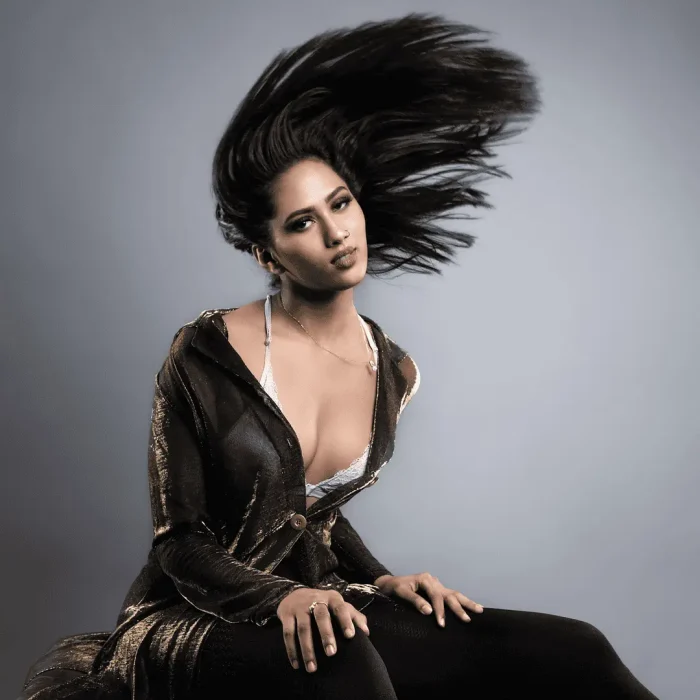 Studio portrait of a lady flicking her hair
